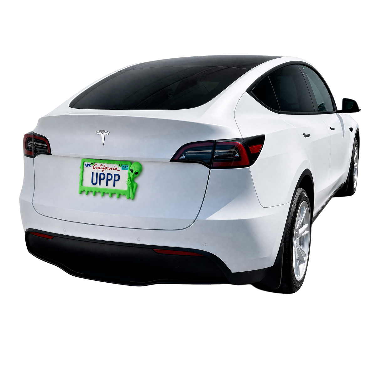 White Tesla with a UPPP slime green alien license plate frame in full daylight