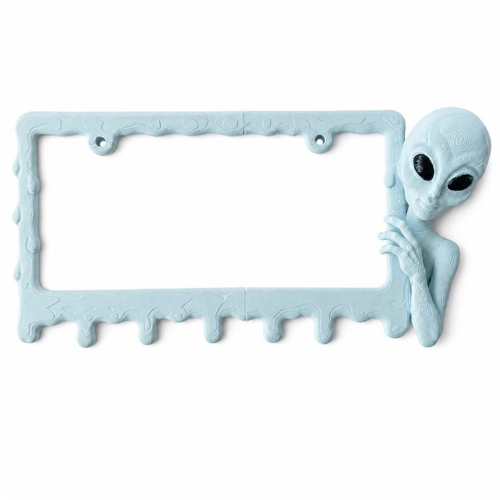 Alien Slime license plate frame in Ice Blue on pure white studio background