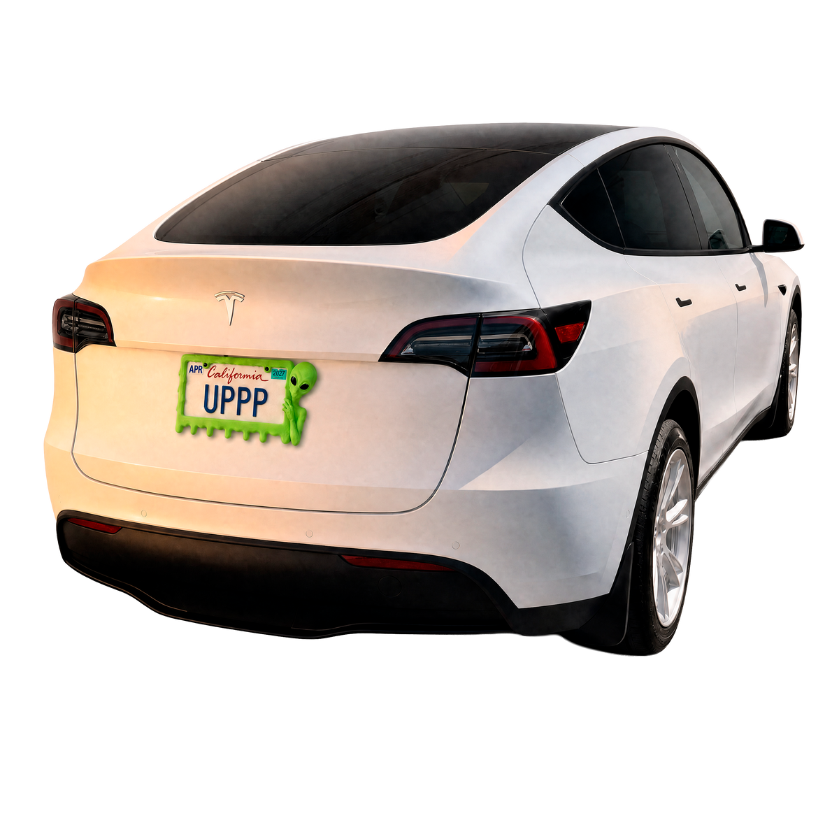 White Tesla with a UPPP slime green alien license plate frame at golden hour