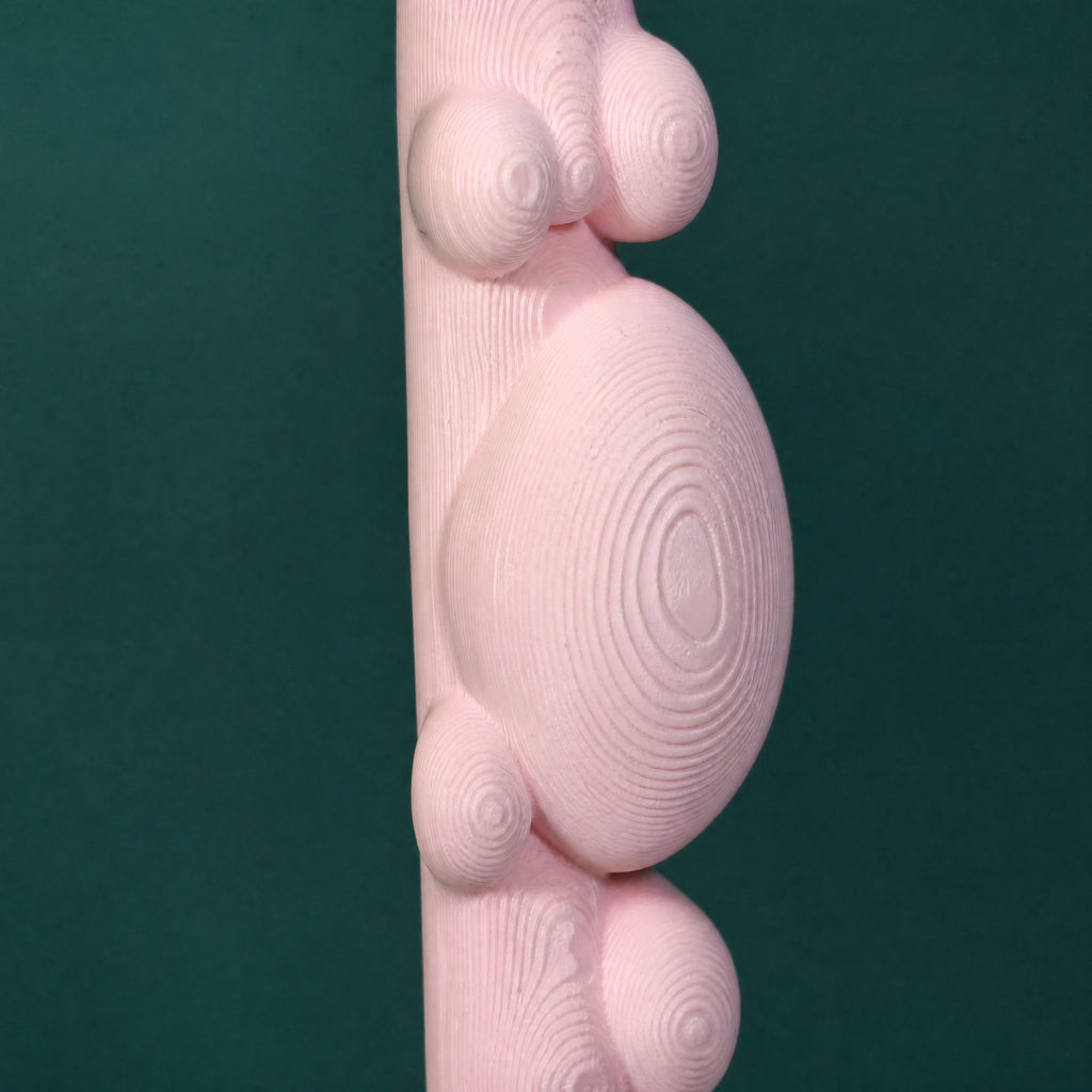 Close-up of the rounded bubble drips and glossy finish in bubblegum pink