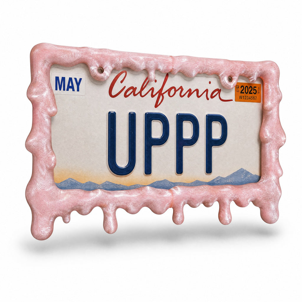 Crystal pink drip license plate frame with a California plate on white