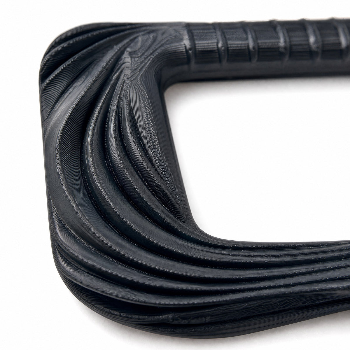 Close-up of the sculpted fabric folds on the black Utopia frame