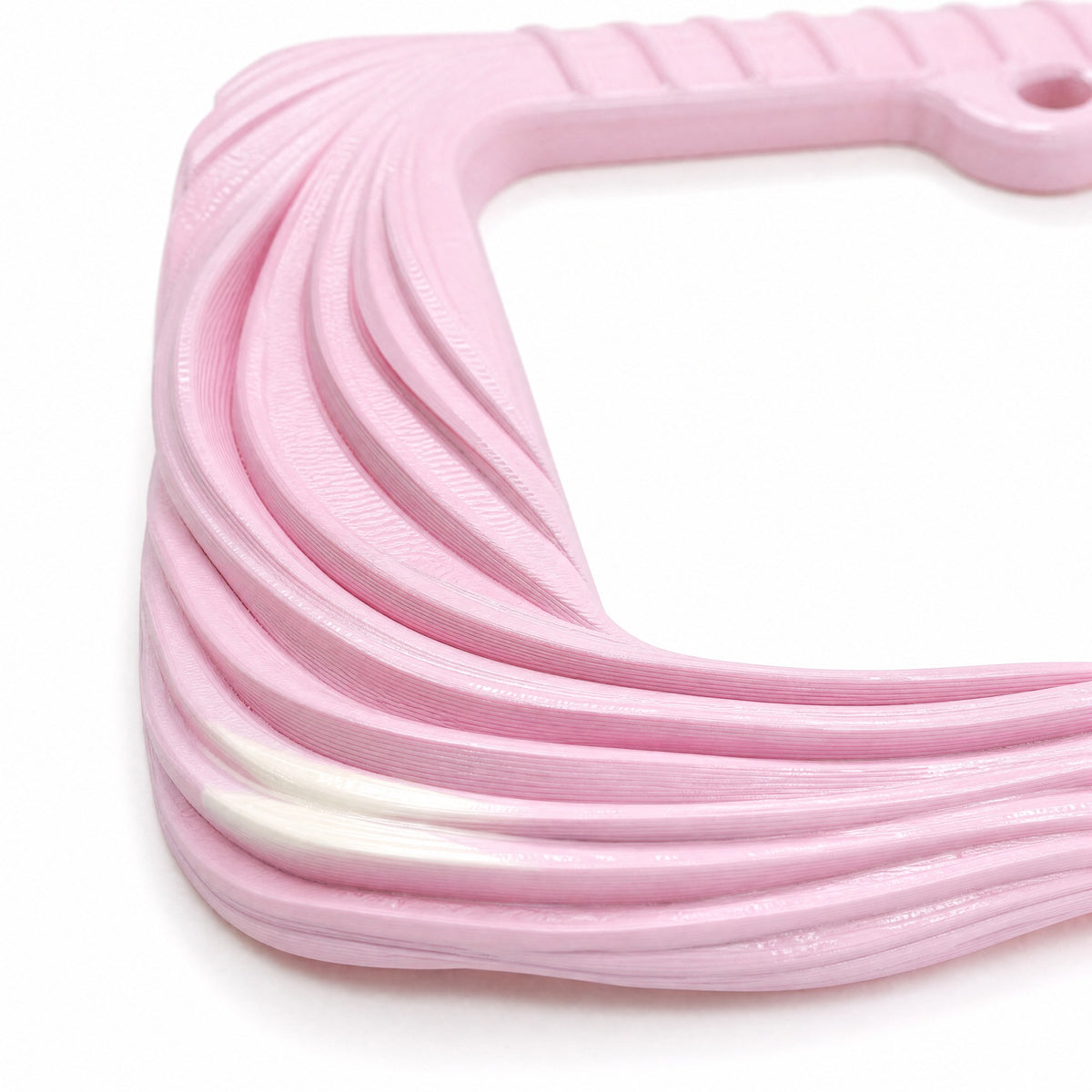 Close-up of the sculpted fabric folds on the blush pink Utopia frame
