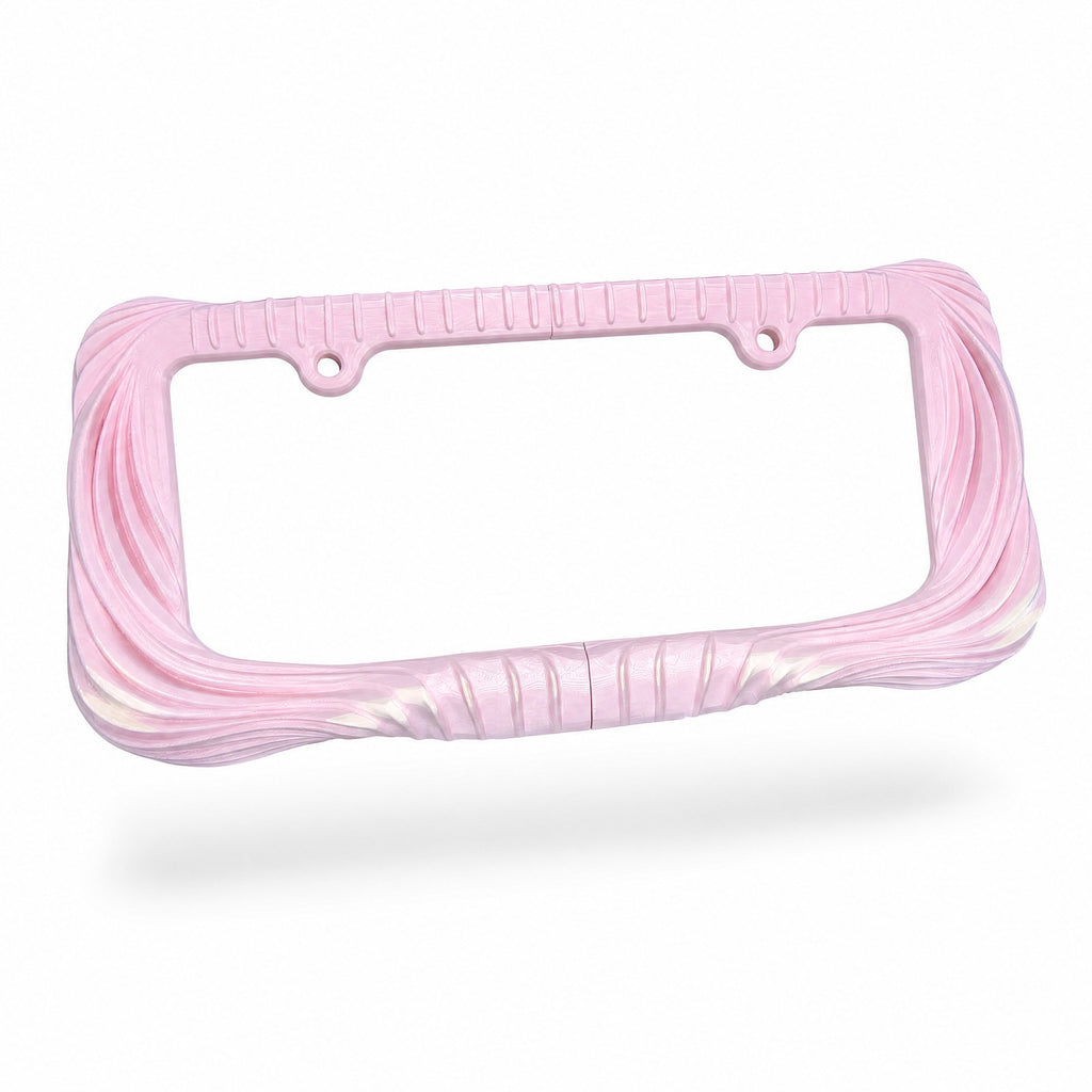 Blush pink Utopia license plate frame at a three-quarter angle above its shadow