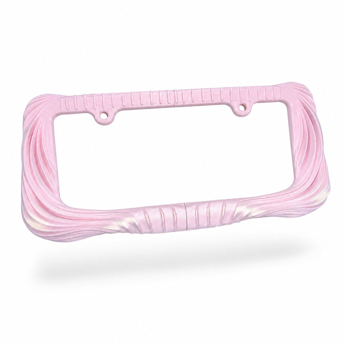 Blush pink Utopia license plate frame at a three-quarter angle above its shadow