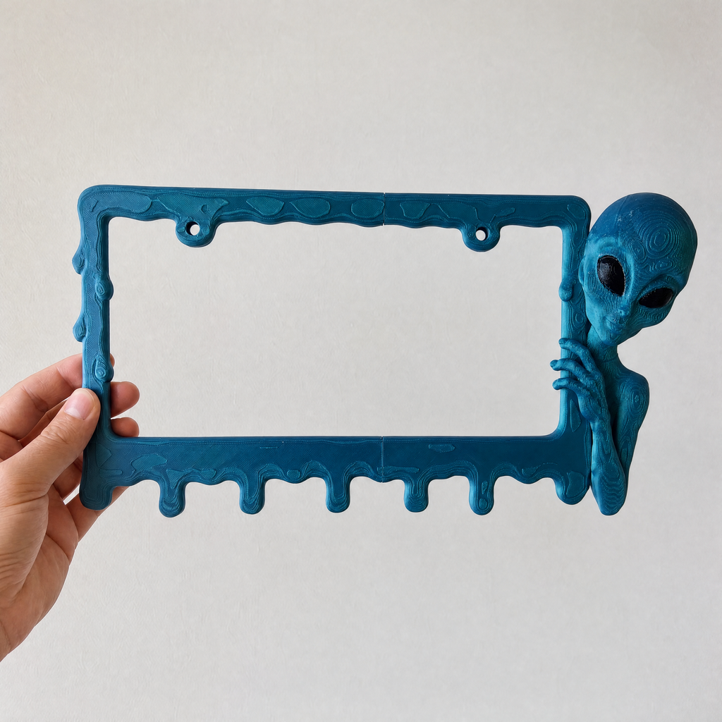 Deep Signal alien frame held in a hand to show its size