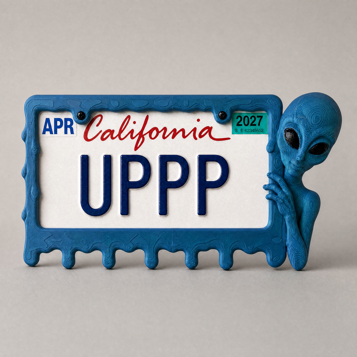 Deep Signal alien frame with a California plate on a grey backdrop