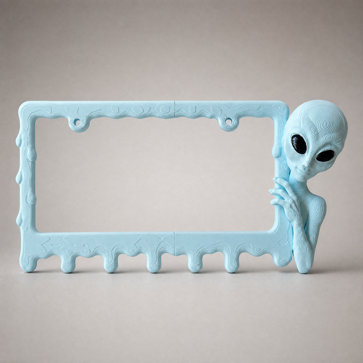 Ice Blue alien frame on a neutral grey studio backdrop
