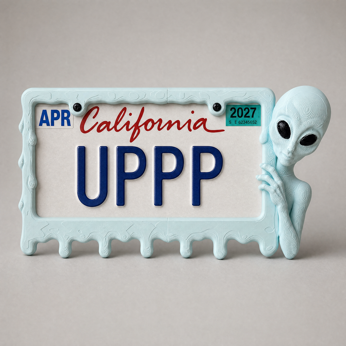 Ice Blue alien frame with a California plate on a grey backdrop