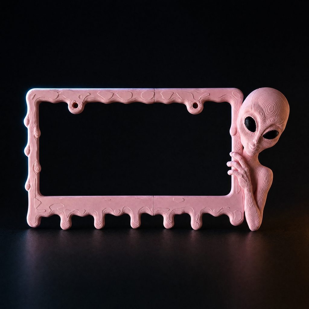 Bubblegum alien frame on a charcoal background with rim lighting